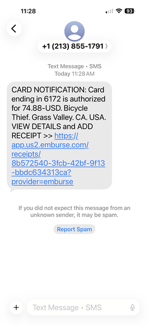 SMS message showing a card transaction notification with amount, merchant, and a link to view details and add a receipt.